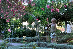 Pretty gardens. Mom stopping to sniff a flower.